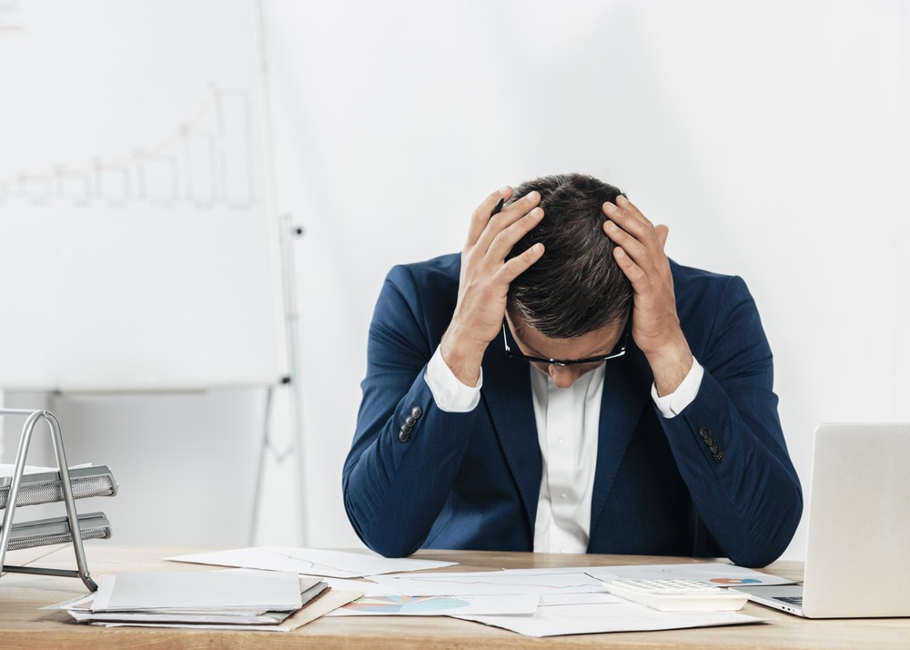 Medium Shot Stressed Man Looking Papers (1)