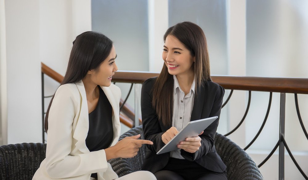 Two Businessmen Looking Tablet Use Tablet (1) (1)