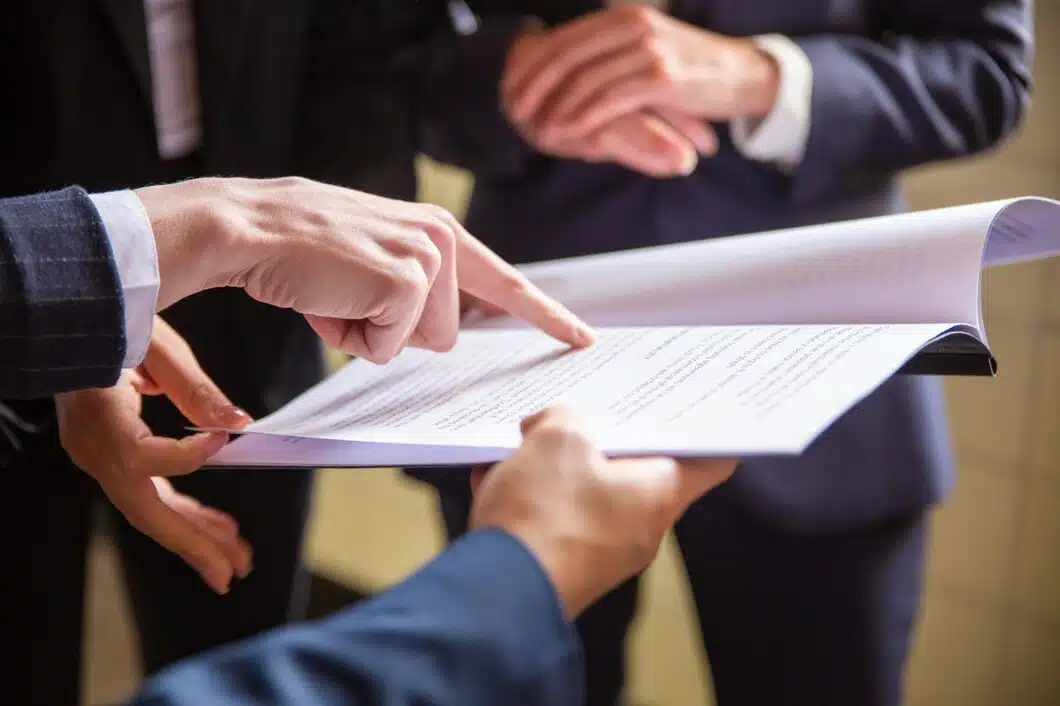 Cropped view businesswomen reading document 74855 4169