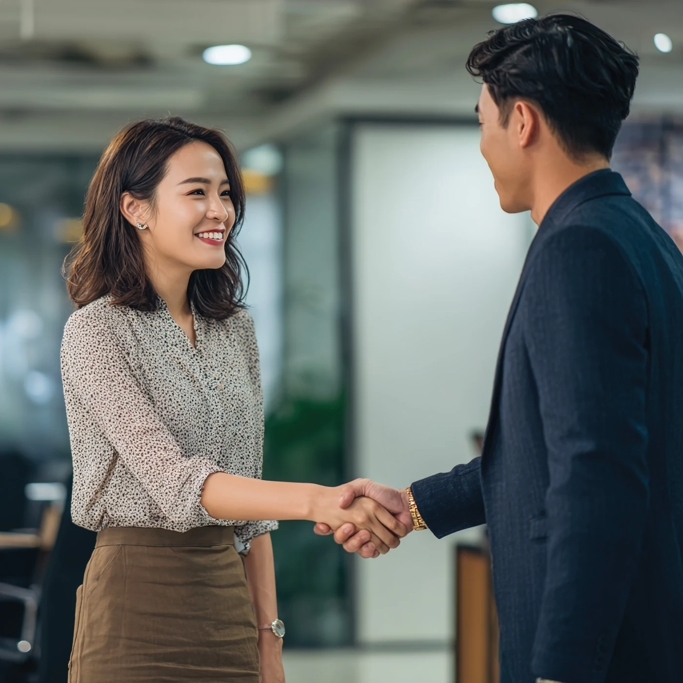 Business representatives shaking hands